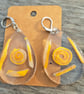 2 Designs Lemon and cream resin earrings
