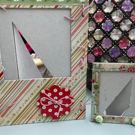 A pair of matching quirky chipboard photo frames