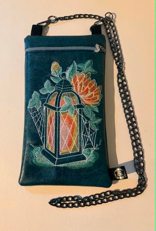 Embroidered Lantern Crossbody Bag – Dark Teal Vinyl – Floral & Web Design 