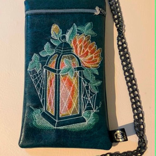 Embroidered Lantern Crossbody Bag – Dark Teal Vinyl – Floral & Web Design 