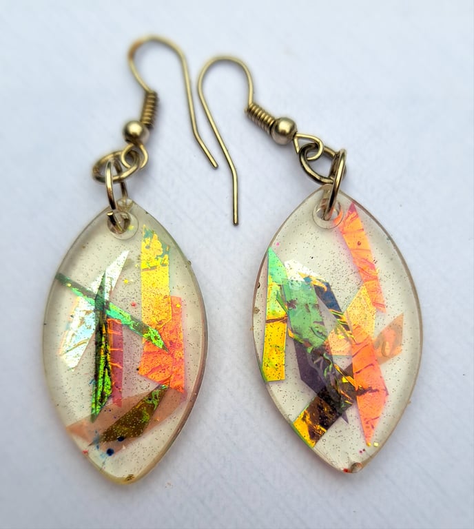 Oval shaped resin earrings with dichroic film