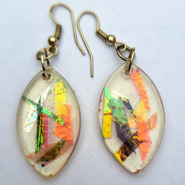 Oval shaped resin earrings with dichroic film
