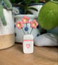 Ceramic Flowers in a little Ceramic Vase