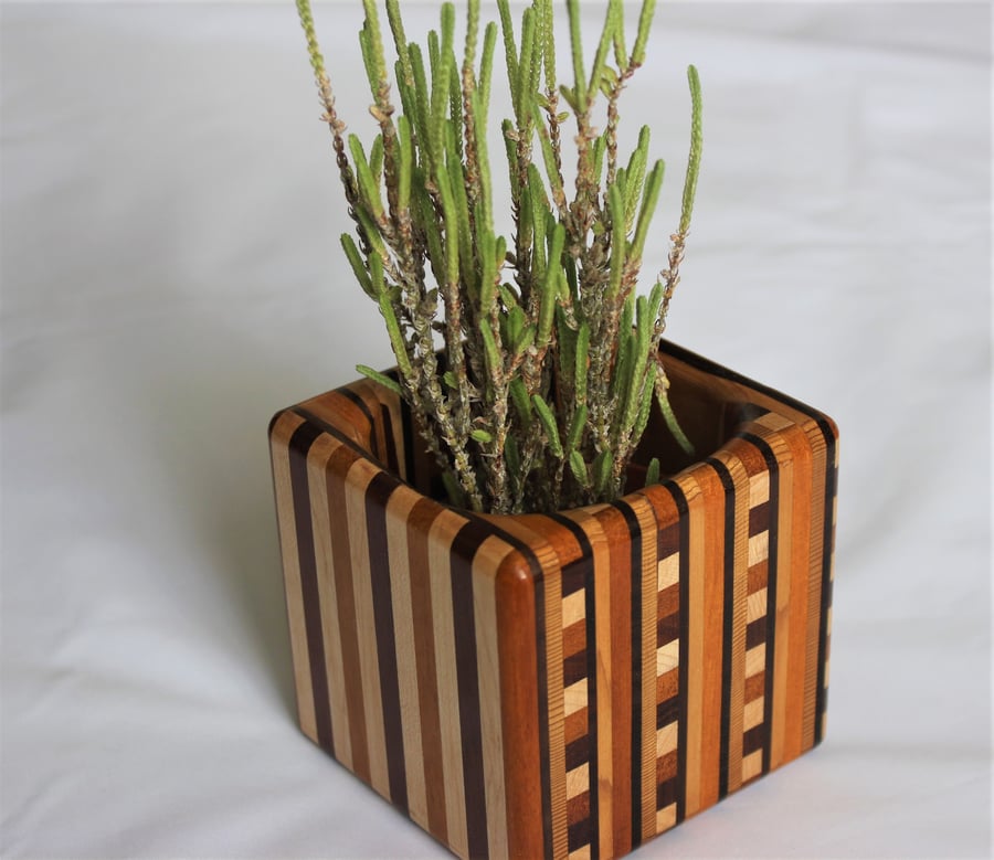 Laminated wooden pot.