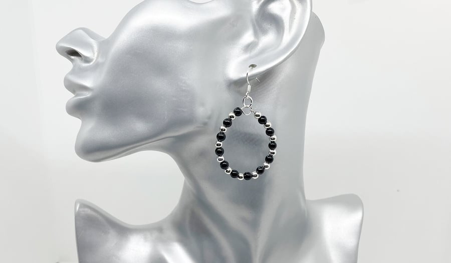 Teardrop pierced hoop earrings black faux pearl glass beads silver spacers.