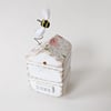 Wooden Beehive With Little Clay Bee 'Home'