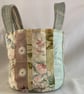 Petite patchwork circular handbag or bucket bag.