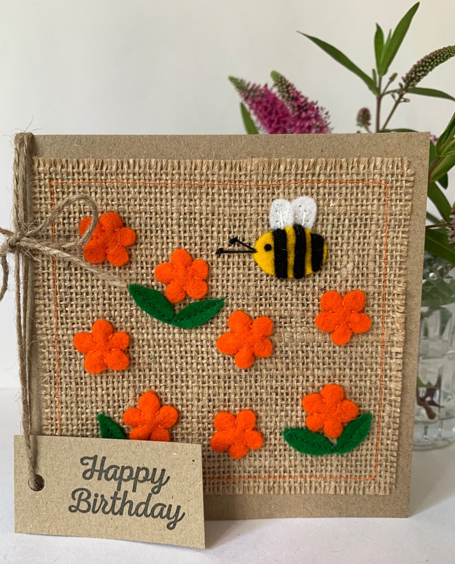Handmade Birthday Card. Bright orange flowers with a bee from wool felt.