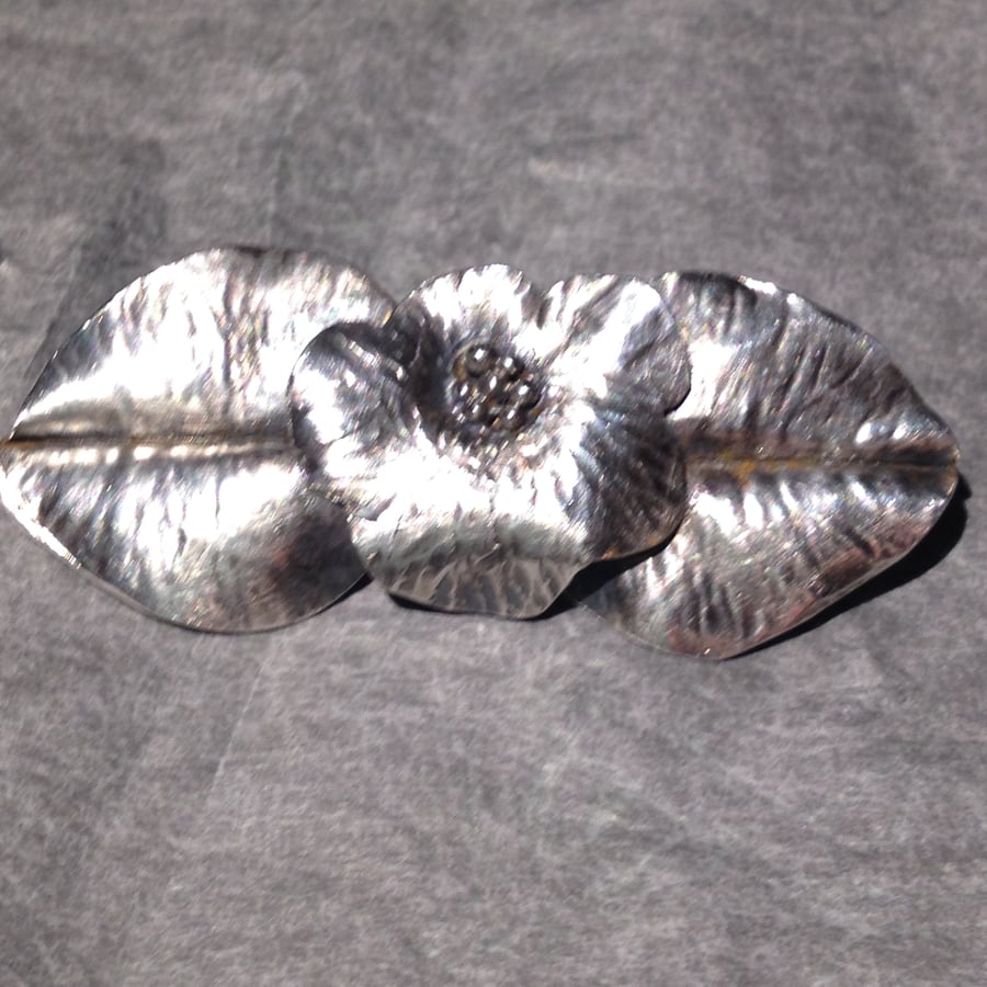 Silver flower and leaves brooch