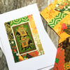 Handmade card. Indian elephants on green.