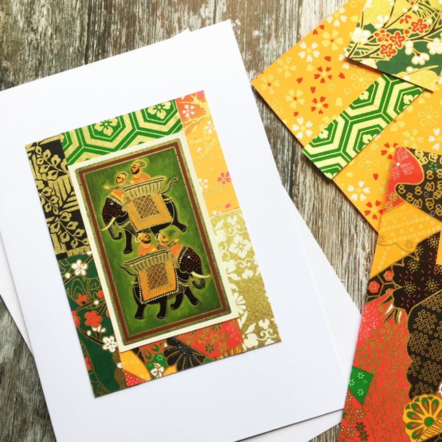 Handmade card. Indian elephants on green.