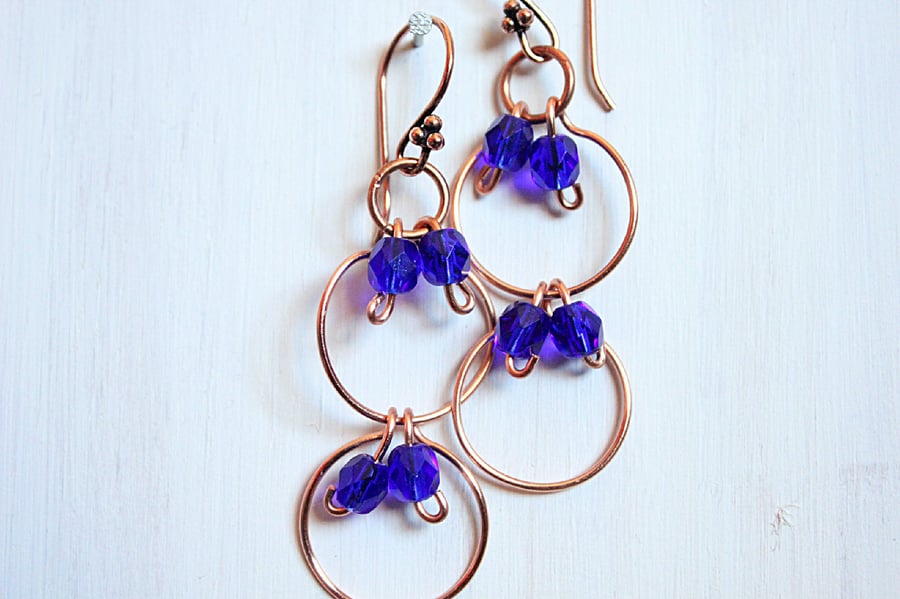 Dark blue faceted glass bead and copper multi link dangle earrings