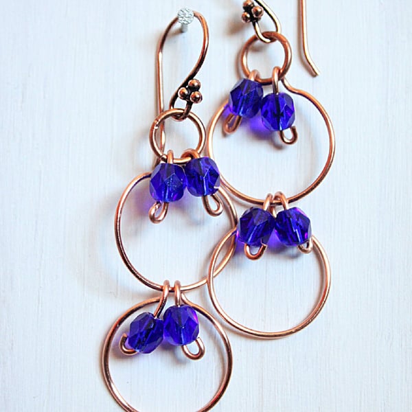 Dark blue faceted glass bead and copper multi link dangle earrings