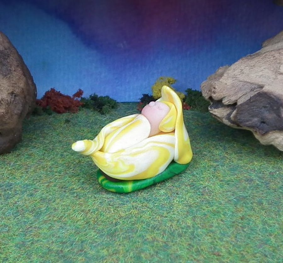 Baby Gnome in a petal crib 'Mim' OOAK Sculpt by Ann Galvin