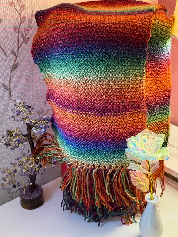Hand knitted sparkly scarf.
