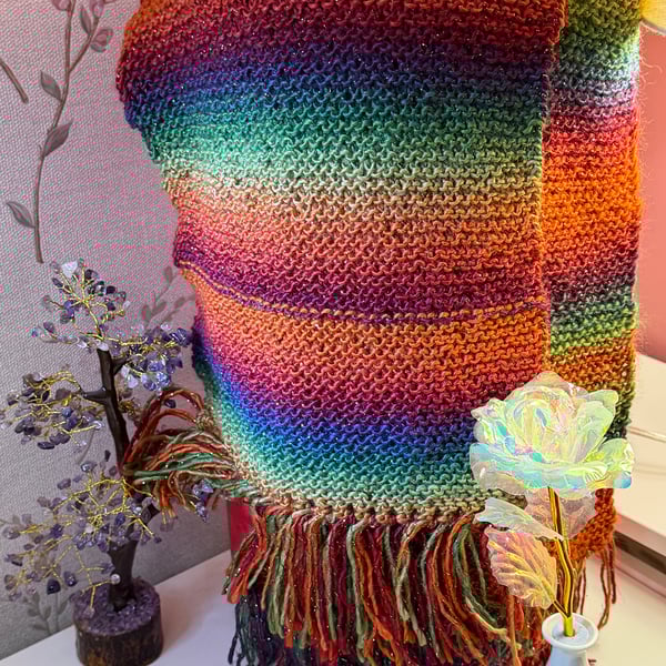 Hand knitted sparkly scarf.