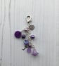Purple Bag Charm with Dorset Button and Beaded Angel - Image 1
