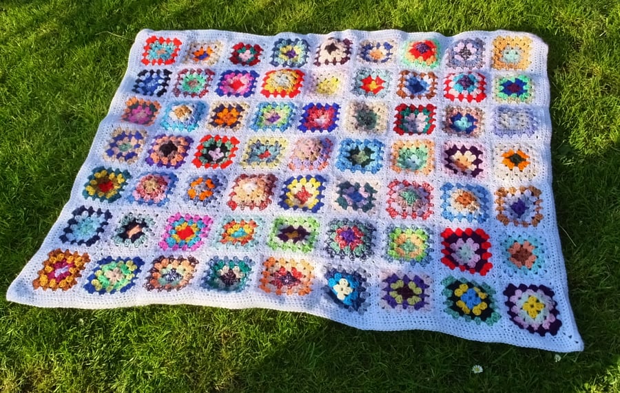 White crochet baby or dolls blanket 40" x 32". For cot, pram or push chair.