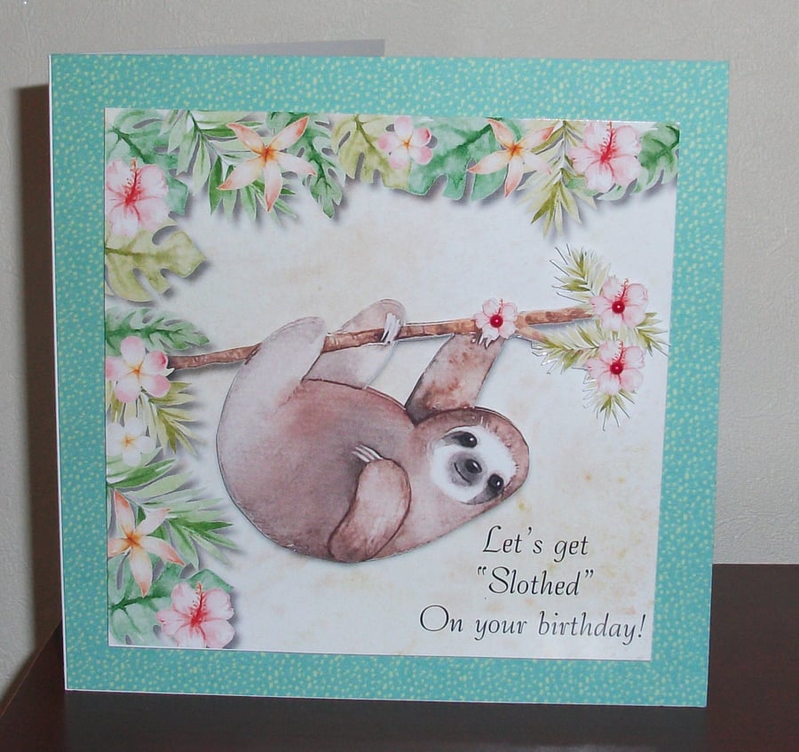 Funny Sloth birthday card with "Let's get Slothed on your birthday" greeting