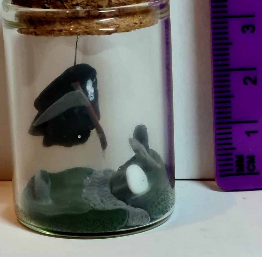 Teeny Grim Reaper in Graveyard