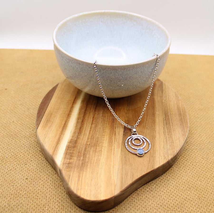 Silver pendant with blue Agate stone