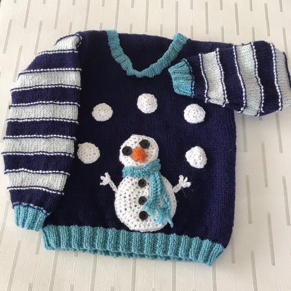 Juggling snowman jumper