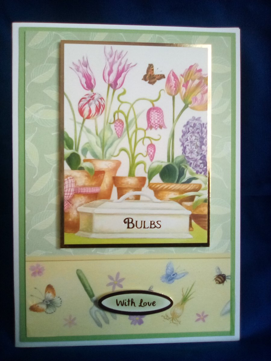 An open card with the theme of tulips
