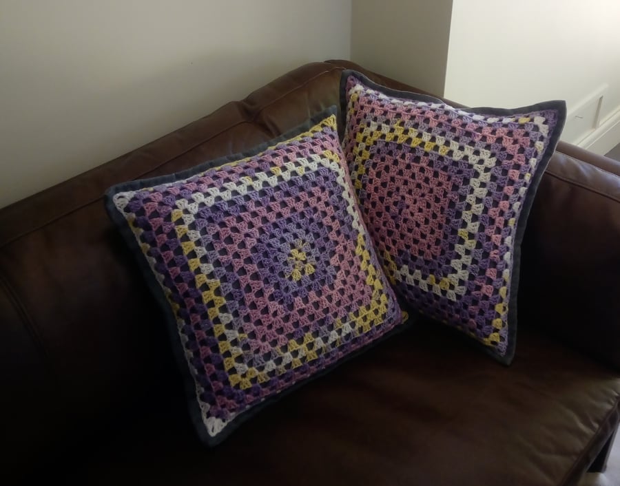 Multi-coloured granny square cushion