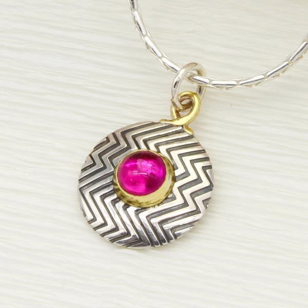 Zigzag sterling silver pendant, handmade featuring a pink Corundum gemstone. 