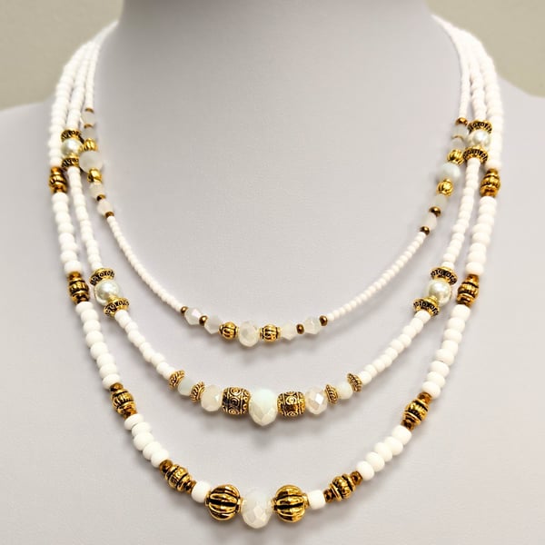 White and Gold Multi Strand Beaded Necklace