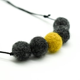 Felted bead necklace in ochre and grey wool
