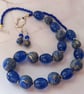 Blue and gold polymer clay dangly earrings - Image 5