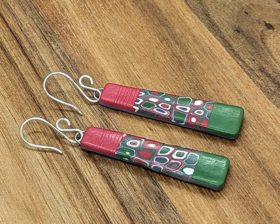 Red and green patterned earrings
