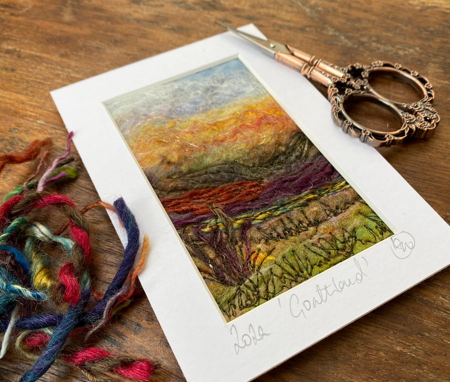 Embroidered wet felting landscape of sunset over Goathland.