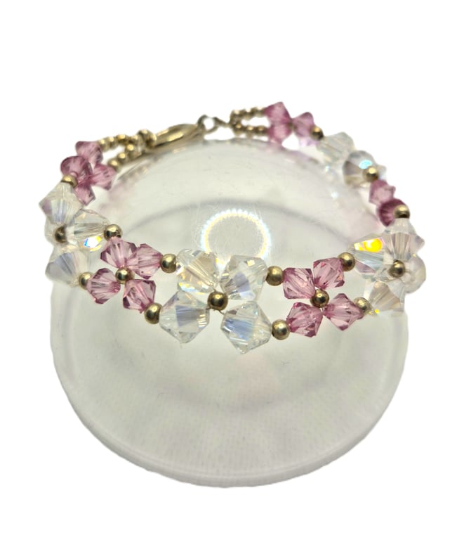 Flower shaped bracelet with clear and pink Swarovski crystals