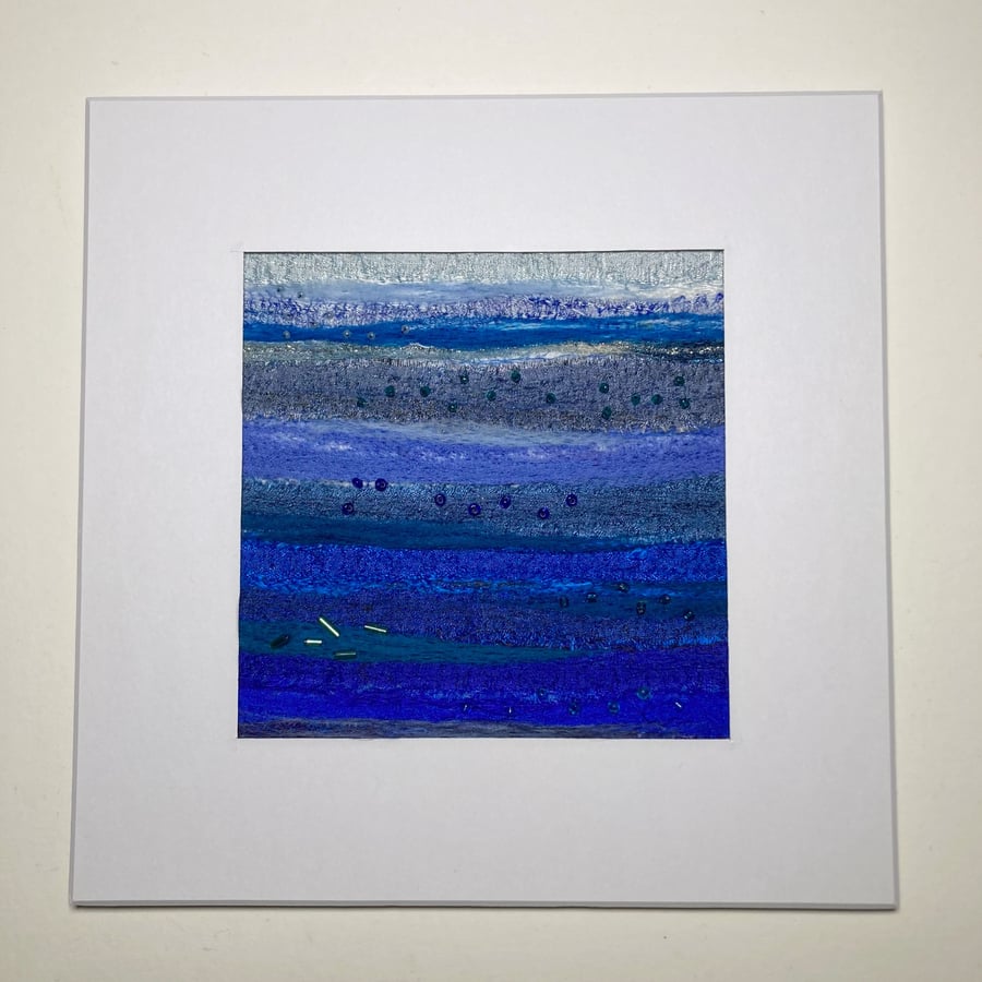 Abstract textile art, needle felted silk and wool, study in blue