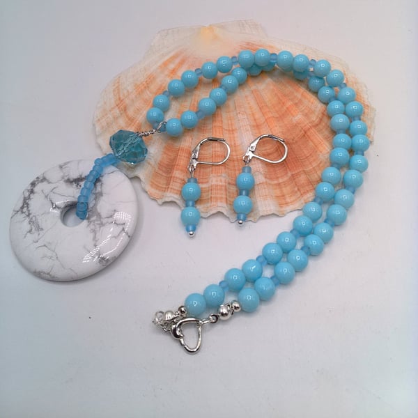 White Stone Donut Pendant on a Pale Blue beaded Necklace and Earrings, Gift Set