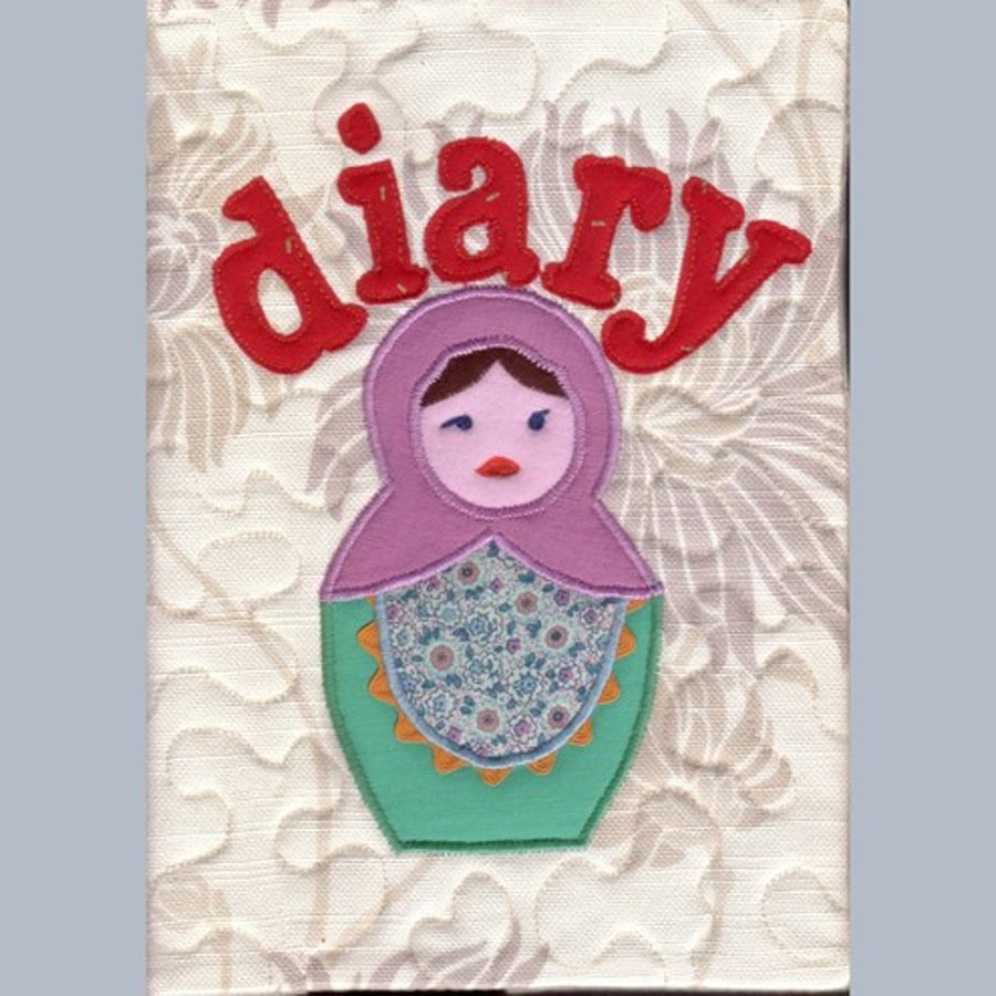 Appliqued Russian doll diary 2012 (fabric cover)