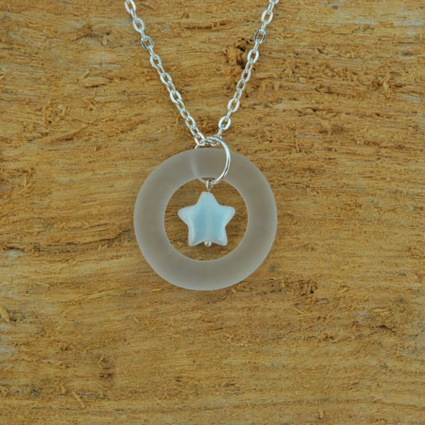 Glass ring pendant with star