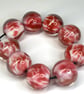 Handmade pink and white patterned lamp work glass beads - Image 3