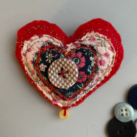 Love heart brooch with button