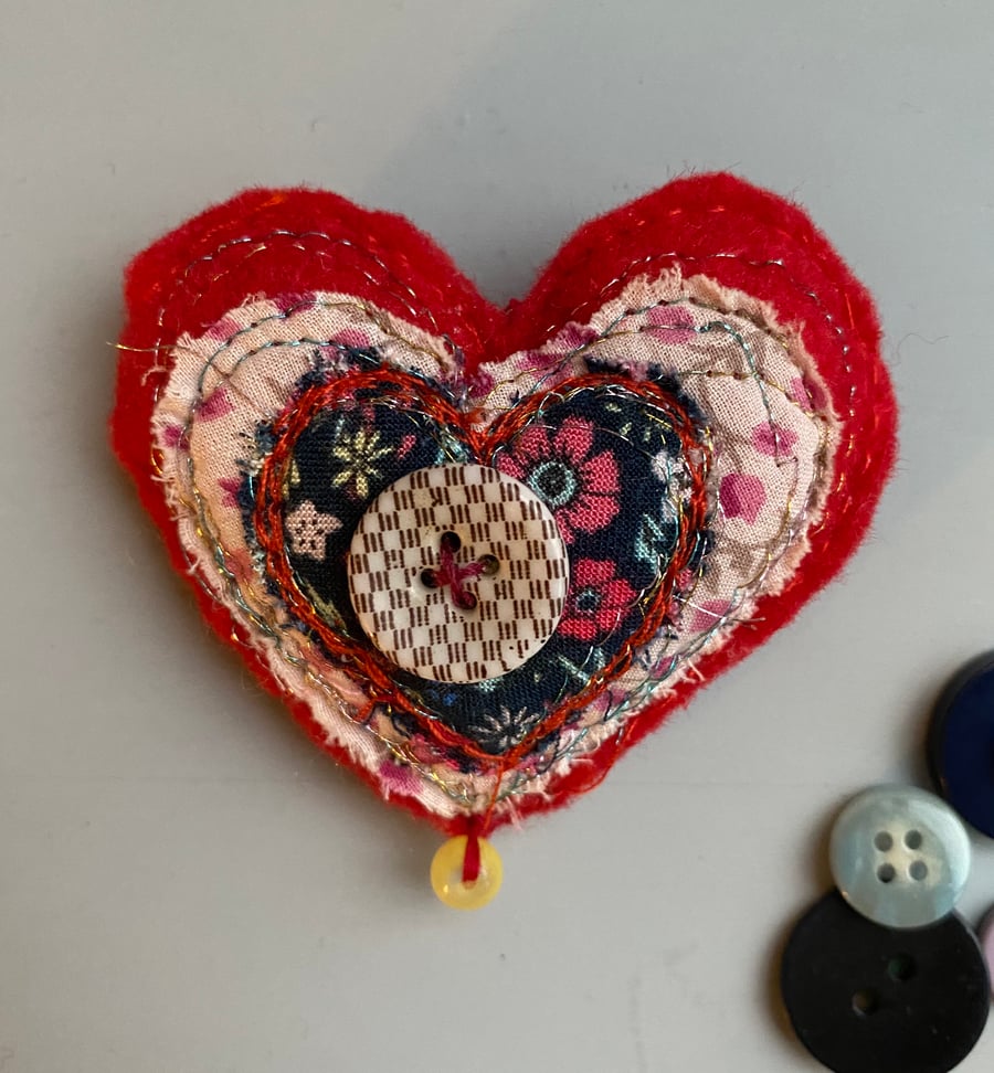 Love heart brooch with button