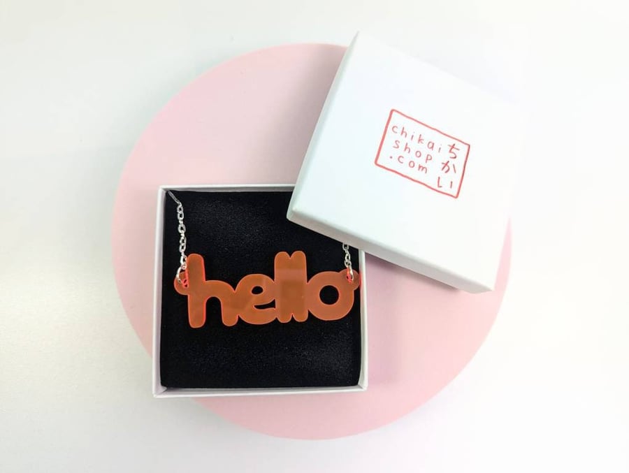 Hello necklace on neon pink translucent acrylic with silver plated chain