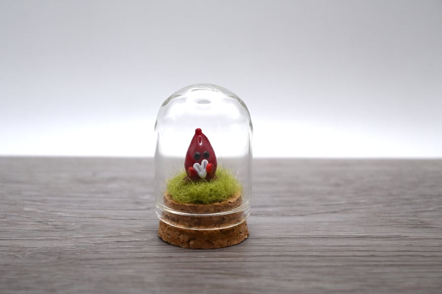 small glass wisp keepsake figure