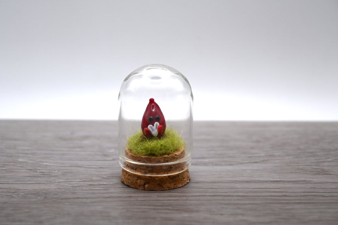 small glass wisp keepsake figure