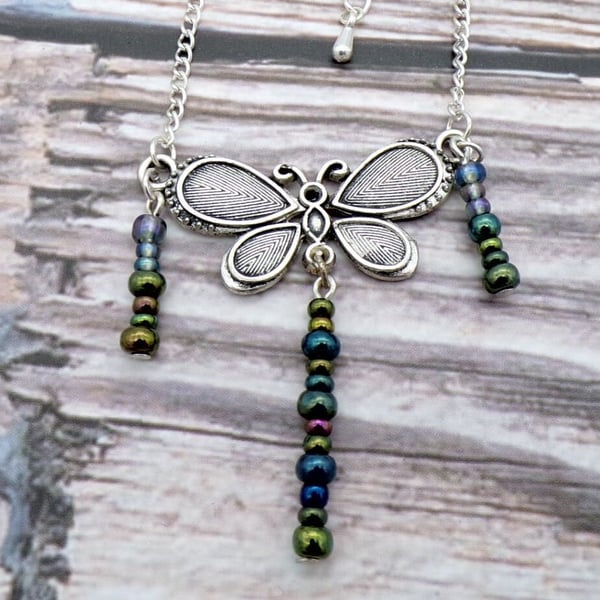 Silver Metal Butterfly Pendant- Metallic Glass Bead Tassels- 18 Inch Adjustable 