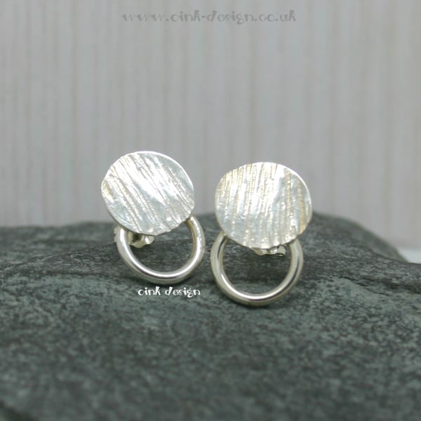Sterling silver textured circular stud earrings