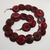 Cherry coloured button necklace