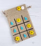 Sunshine and raindrop themed Tic Tac Toe game - Image 1