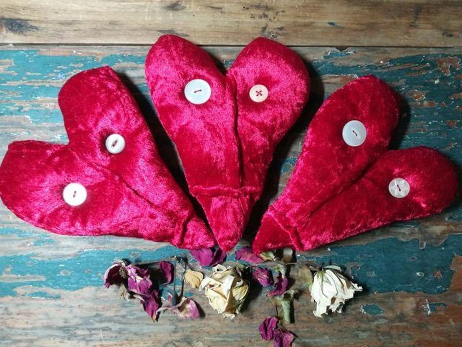 Wall hanging red velvet heart, textile art face, anthropomorphic face